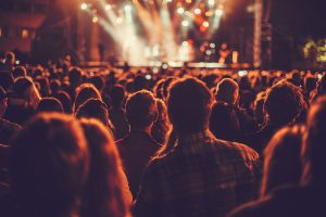 Big concert audience listening to music
